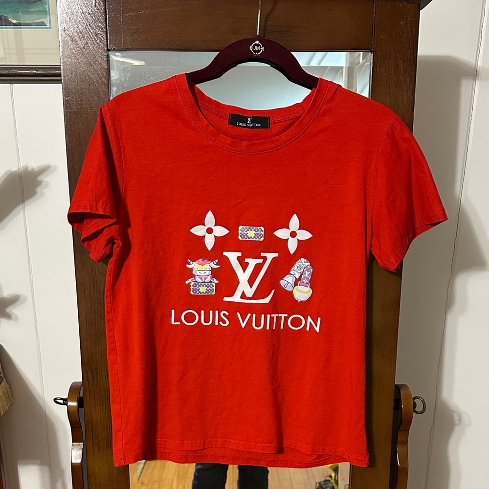 Outrageous Louis Vuitton Red Tee with Iconic Motifs